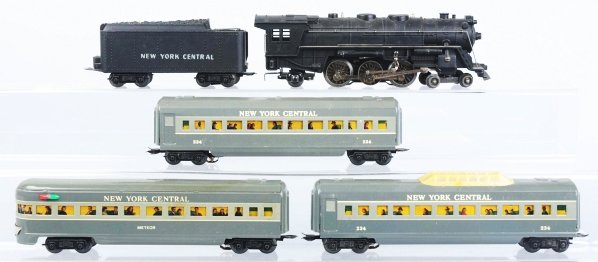 Marx Electric Passenger Train Set.: American. Pre-war. Set includes steam-type engine with New York Central tender, made of diecast metal, no. 234 Dining Car, no. 234 Vista Dome car, one Meteor Observation car that shows passengers in t