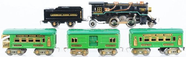 American Flyer O-Gauge Passenger Train Set.: Pre-war. Includes steam engine with frozen motor (may needs to be re-wheeled or re-geared), matching American Flyer Lines tender, and three passenger cars. Decals are nice. Some oxidation to a couple