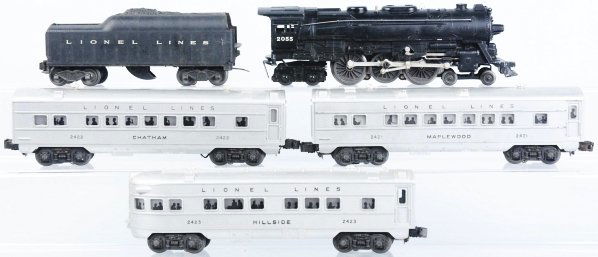 Lionel No. 2055 Passenger Train Set.: American. Post-war. Includes no. 2055 steam engine with no. 2046 whistle tender and three passenger cars consisting of no. 2421 Maplewood, no. 2422 Chatham, and no. 2423 Hillside. Some scratching and
