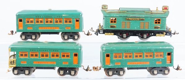 Lionel O-Gauge No. 253 Passenger Train Set.: American. Pre-war. Includes no. 253 engine in peacock blue with two matching no. 607 pullman cars and no. 608 observation car. Engine is missing one stanchion and has scratching to edges of roof and c