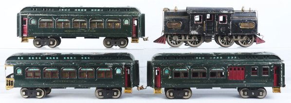 Lionel No. 42 Passenger Train Set.: American. Standard gauge. Includes New York Central Lines no. 42 electric style train engine and three dark green passenger cars consisting of no. 428 parlor car, no. 429 baggage car, and no. 430 obse
