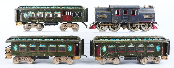 Lionel Standard Gauge No. 42 Passenger Train Set.: American. Includes no. 42 electric engine missing one headlight on roof and three passenger cars consisting of no. 18 parlor car, no. 19 parlor car, and no. 190 observation car. Set has some scratchin