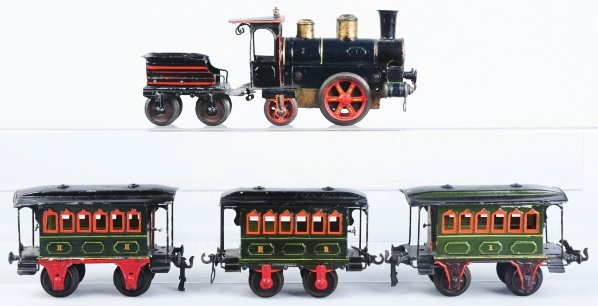 Marklin 1-Gauge Passenger Train Set.: German. Includes European style Marklin steam engine with "1" embossed on center boiler. Also has some gold and red highlight striping and a plate on bottom marked "Made in Germany". Also comes with m