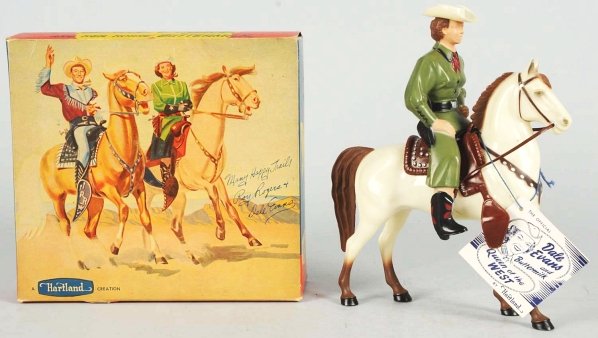 Hartland Dale Evans Figure with Horse.: Figure comes with hat, tag, and saddle but missing gun. Some scratching underneath of saddle and two scratches to face. Includes original box marked "No. 802" and "Many Happy Trails Roy Rogers and Dal