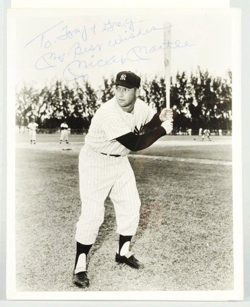 Original Autographed Photograph of Mickey Mantle.: Nice photo of 1960s Mantle in left-handed batting stance. Inscribed in blue ink, "To Tony and Greg my best wishes Mickey Mantle". Comes with an LOA from JSA. Condition (Excellent). Size 8" x 10".