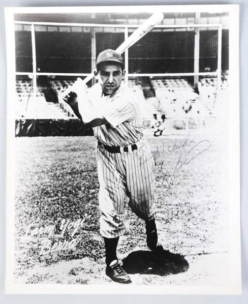 Signed Larry "Yogi" Berra Photograph.: Reads "Best Wishes Yogi Berra" and shows Berra in full Yankees uniform, swinging his bat. Some slight creasing to corners. Includes LOA from JSA. Condition (Very Good). Size 8" x 10".