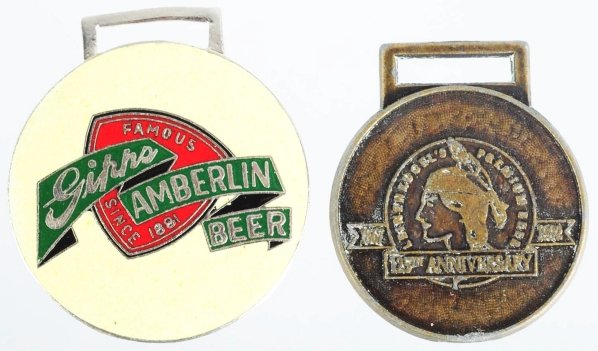 Lot of 2: Beer Fobs.: Includes Gipps with nice enameled porcelain insert and some wear overall and Leinenkugel for the 1922 25th Anniversary. Condition (Very Good - Excellent). Size Largest: 1 - 3/4" T.