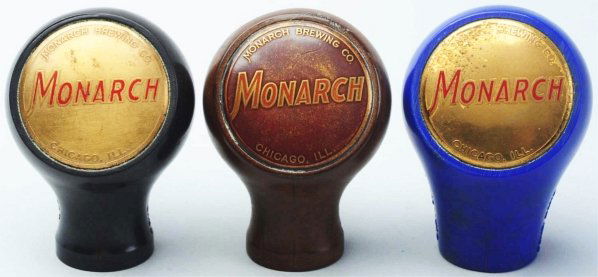 Lot of 3: Monarch Beer Tap Knobs.: Includes one in blue with some wear and marks to face, one in brown with some slight wear to face, and one in black with brass that has light marks on face. Condition (Very Good).