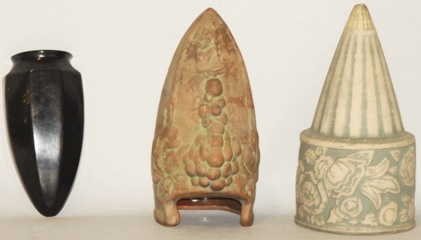 Lot of 3: Wall Hangers.: Includes a Peters & Reed black wall pocket with chip to point at bottom, a Peters & Reed Moss Aztec wall pocket (grapes), with chips to hanging hole, and a Robinson Ransbottom hanging planter. Conditi