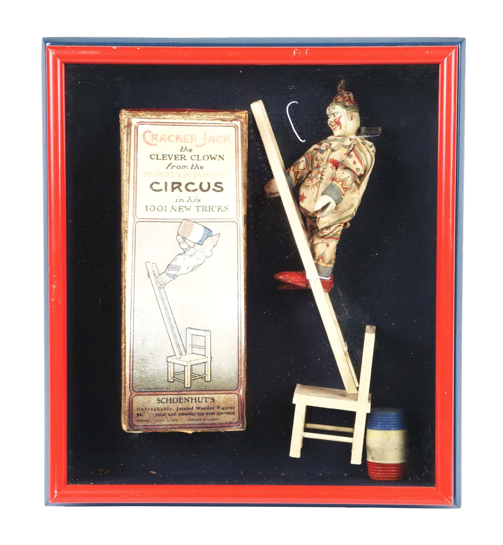 SCHOENHUT CRACKER JACK THE CLEVER CLOWN IN ORIGINAL BOX: Box marked "From the Humpty & Dumpty Circus." Includes clown, ladder, barrel and chair. Box, clown and accessories are framed. Looks like the box itself has a laser printed label. Condition: (Very Goo