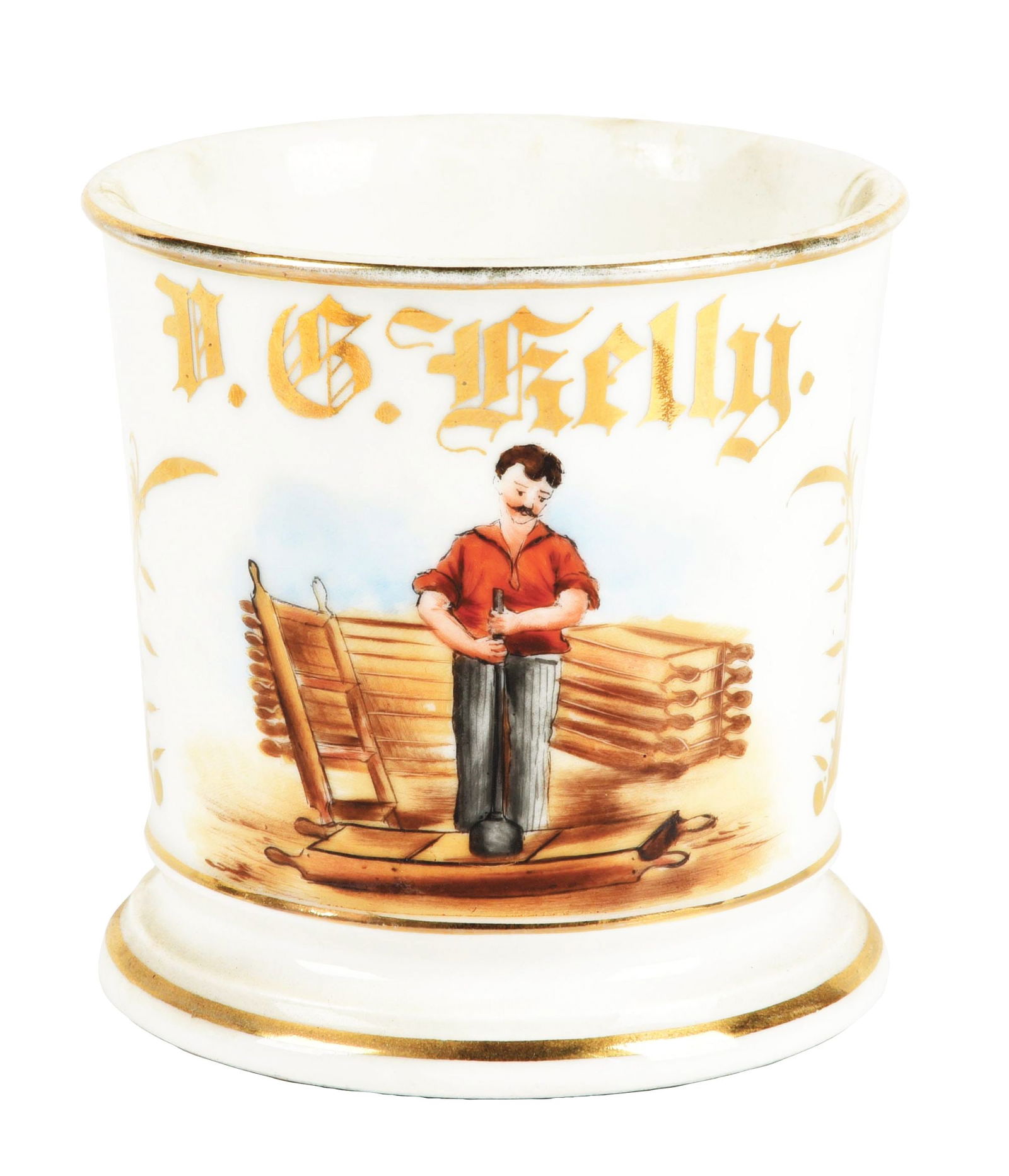 LADDER MAKER SHAVING MUG: Has the name "D.G. Kelly" in gold gilt. Mug is stamped "T&V France" under base. Unique image of a man making step ladders. Condition: (Excellent) Item Dimensions: 4 - 1/2" x 3 - 1/2" x 3 - 1/2".
