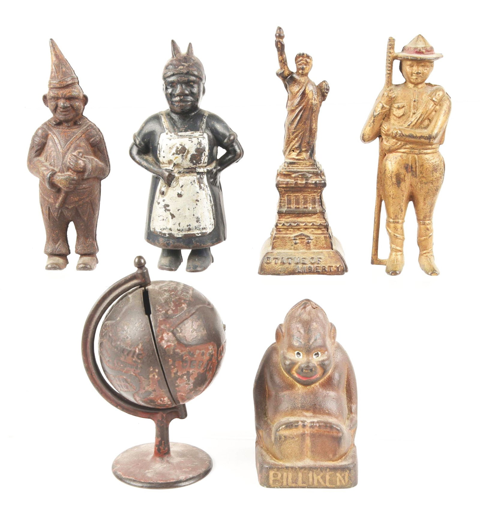 LOT OF 6: STILL BANKS: Grey iron globe on arc, A. C. Williams clown, Billiken good luck, Mammy with spoon, small Statue of Liberty and a Boy Scout. Condition: (Fair - Good) Item Dimensions: Largest: 3 - 1/2" x 3" x 5".