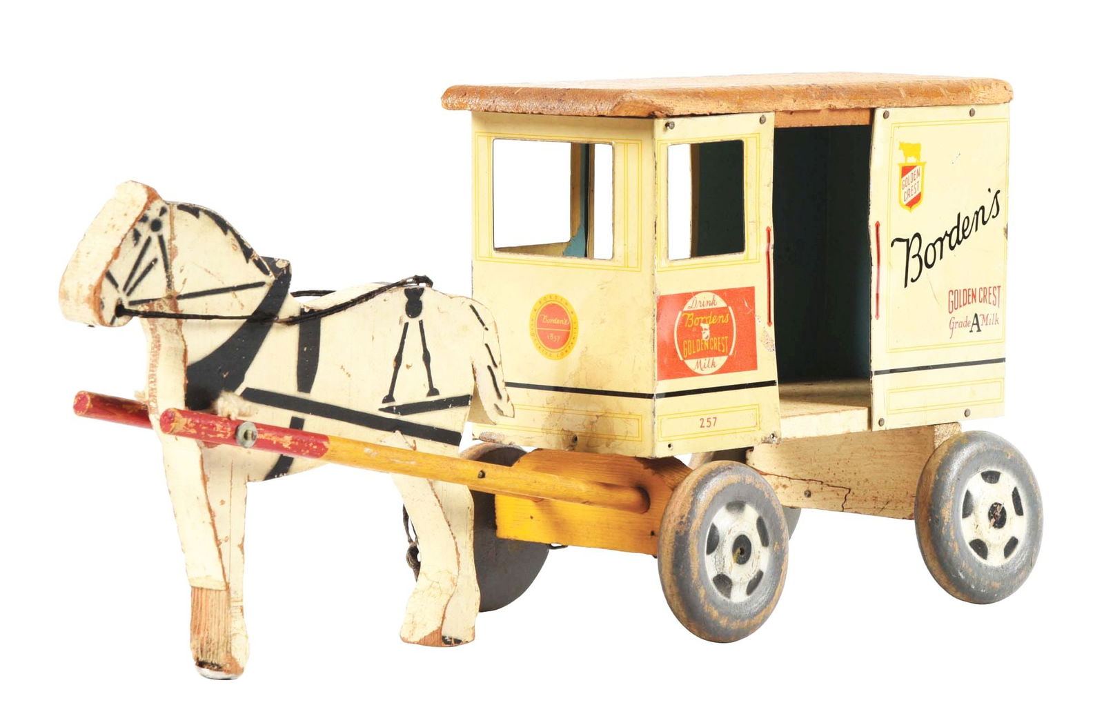 RICH TOYS BORDEN'S MILK & CREAM HORSE-DRAWN WAGON: Mostly wooden. Tin sides of cart. General wear throughout. Condition: (Very Good - Excellent) Item Dimensions: 18" x 5 - 1/2" x 8 - 1/4".