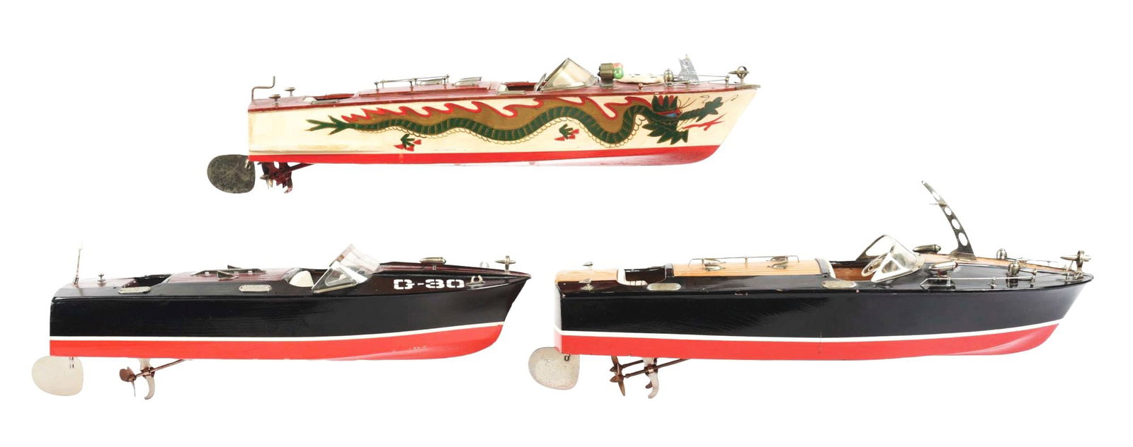 LOT OF 3: JAPANESE BATTERY-OPERATED WOODEN BOATS: C. 1950s. Includes dragon speedboat, G-30 speedboat and medium-sized black and red speedboat. All have some wear. Condition: (Very Good - Excellent) Item Dimensions: Largest: 18" x 5 - 1/4" x 3".