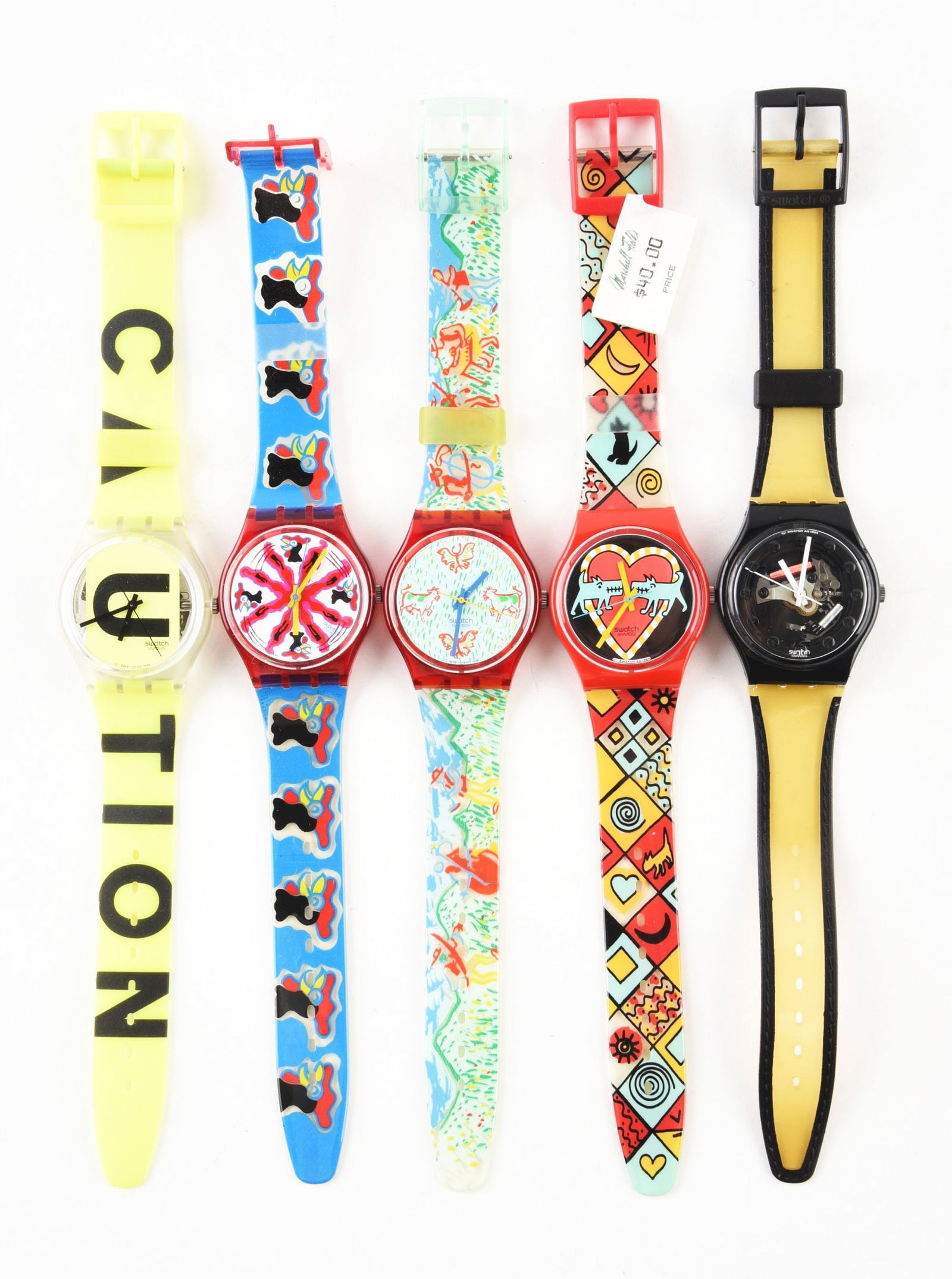 LOT OF 5: STANDARD GENTS SWATCHES: (A) GK224 "Caution" Standard Gents Swatch Watch. Issued in 1996. (B) GR112 "Chicchirichi" Standard Gents Swatch Watch. Designed by Massimo Giacon. Issued in 1992. (C) GR120 "Alphorn" Standard Gents Sw