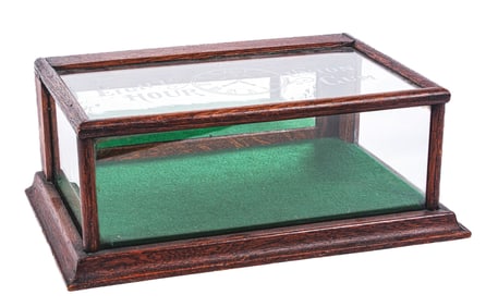 A SMALL COUNTERTOP SHOWCASE ADVERTISING EIGHT HOUR UNION GUM