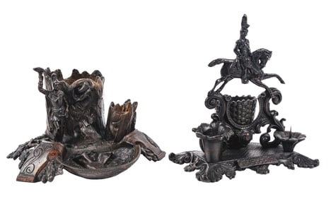 A PAIR OF CAST IRON CIGAR & MATCH HOLDERS