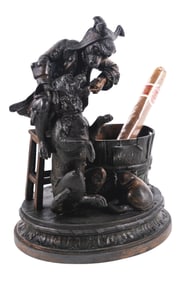 FIGURAL BRONZE CASTING OF A DESKTOP CIGAR HOLDER
