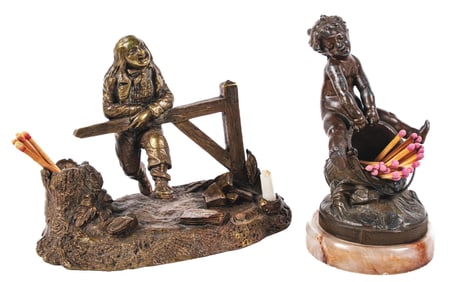 A PAIR OF DESKTOP FIGURAL MATCH HOLDERS