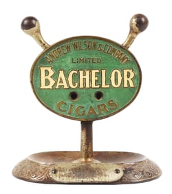 CAST IRON CIGAR CUTTER ADVERTISING BACHELOR CIGARS