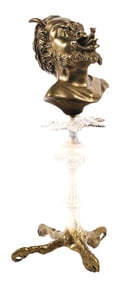 CAST BRONZE CIGAR LIGHTER IN THE FORM OF A DEVIL/MYTHOLOGICAL CREATURE MOUNTED ON A CLAW BASE