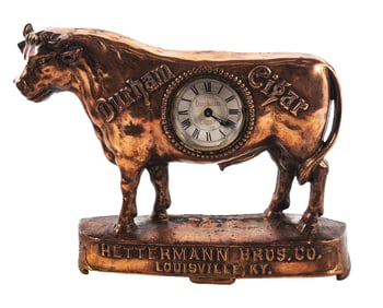 CAST IRON DURHAM CIGAR MANTEL CLOCK