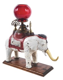 CAST IRON CIGAR CUTTER & LIGHTER IN THE FORM OF AN ELEPHANT