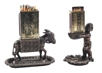A PAIR OF DESKTOP FIGURAL MATCH HOLDERS