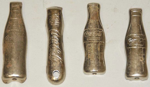 Lot of 4: Coca-Cola Bottle Openers.: Light wear and some pitting. Condition (Excellent). Size Largest: 3 - 1/2" L.