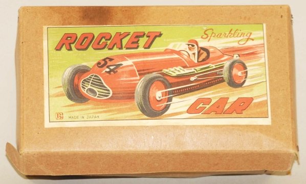 Japanese Friction Bandai Tin Litho Rocket Car.: Includes original box with beautiful colorful paper label. Car needs flint to spark. Condition (Excellent - Near Mint). Size Box: 7 - 1/4" x 4 - 1/4".