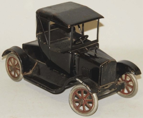 Black Buddy L. Pressed Steel Car.: Decals moderately chipped. Some scratching and paint loss throughout especially to roof and driver's side fender. Condition (Good - Very Good). Size 10 - 3/4" L.