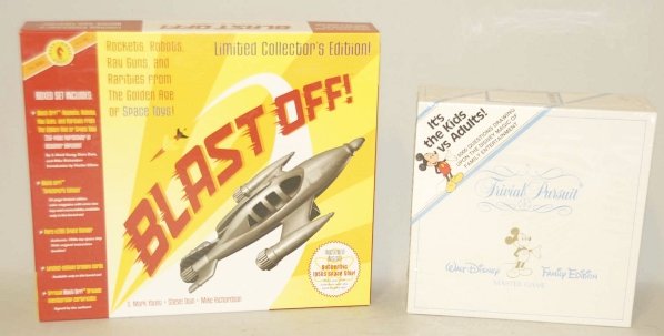 Lot of 4: Assorted Collectible Items.: In original boxes. Includes Walt Disney Trivial Pursuit Master Game, Dark Horse Books, Blast Off Rocket Ship and Book Set, Old Time Radios Mystery Cassette Set, and a Walt Disney Donald Duck Wind Up W