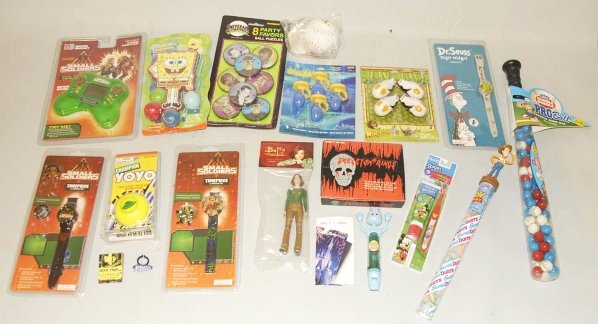 Lot of Small Assorted Character Toys.: Characters represented in this lot include Cat and The Hat, Madagascar, Spongebob, Toy Story and several others. Mostly all with original packaging. Condition (Excellent). Size Largest: 18" L.