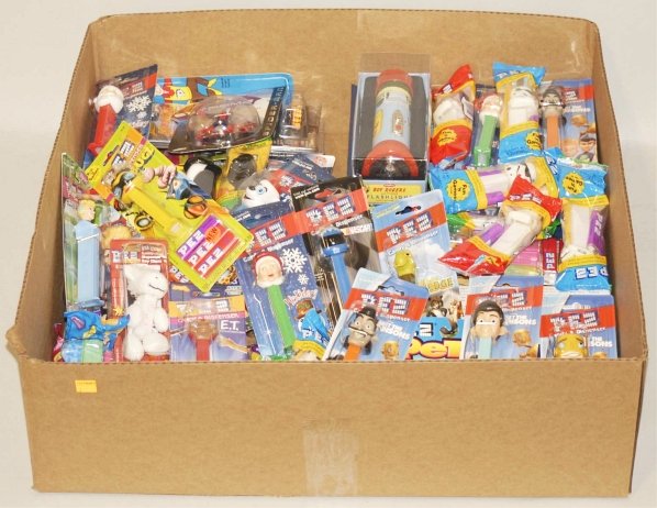 Lot of Assorted Modern Pez Dispensers.: This lot includes Star Wars, Disney, Nascar, Spiderman, and numerous other character Pez dispensers. Mostly in original packing. Condition (Very Good - Excellent). Size Largest Box: 13 - 1/4" x 5 - 1/