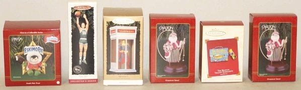 Lot of 17: Hallmark Christmas Ornaments in Boxes.: This lot includes numerous character ornaments includes Superman, Popeye, The Beetles, and numerous Peanuts figures. Condition (Excellent). Size Largest Box: 7 - 3/4" x 3 - 1/2".