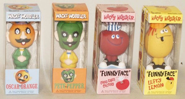 Lot of 4: Wacky Wobbler Toys in Boxes.: This lot includes Oscar the Orange, Pete the Pepper, Choo Choo the Cherry, and Nefty Lemon. Condition (Near Mint). Size Each Box: 7 - 1/2" x 3".