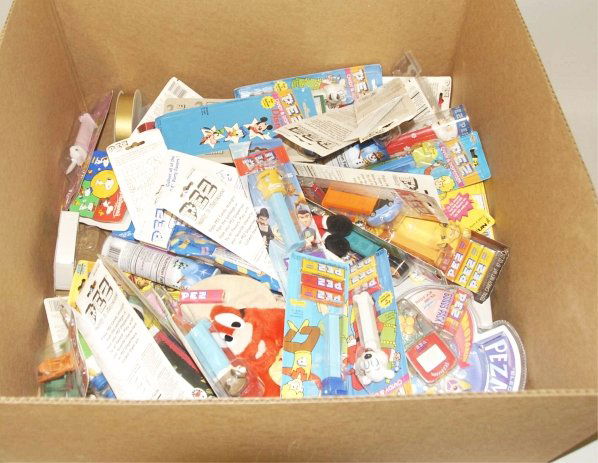 Lot of 1980s-90s Pez Dispensers On Cards.: Includes 25+ modern Pez dispensers and various other small novelty items. Condition (Very Good - Excellent). Size Largest Box: 9 - 1/2" T.