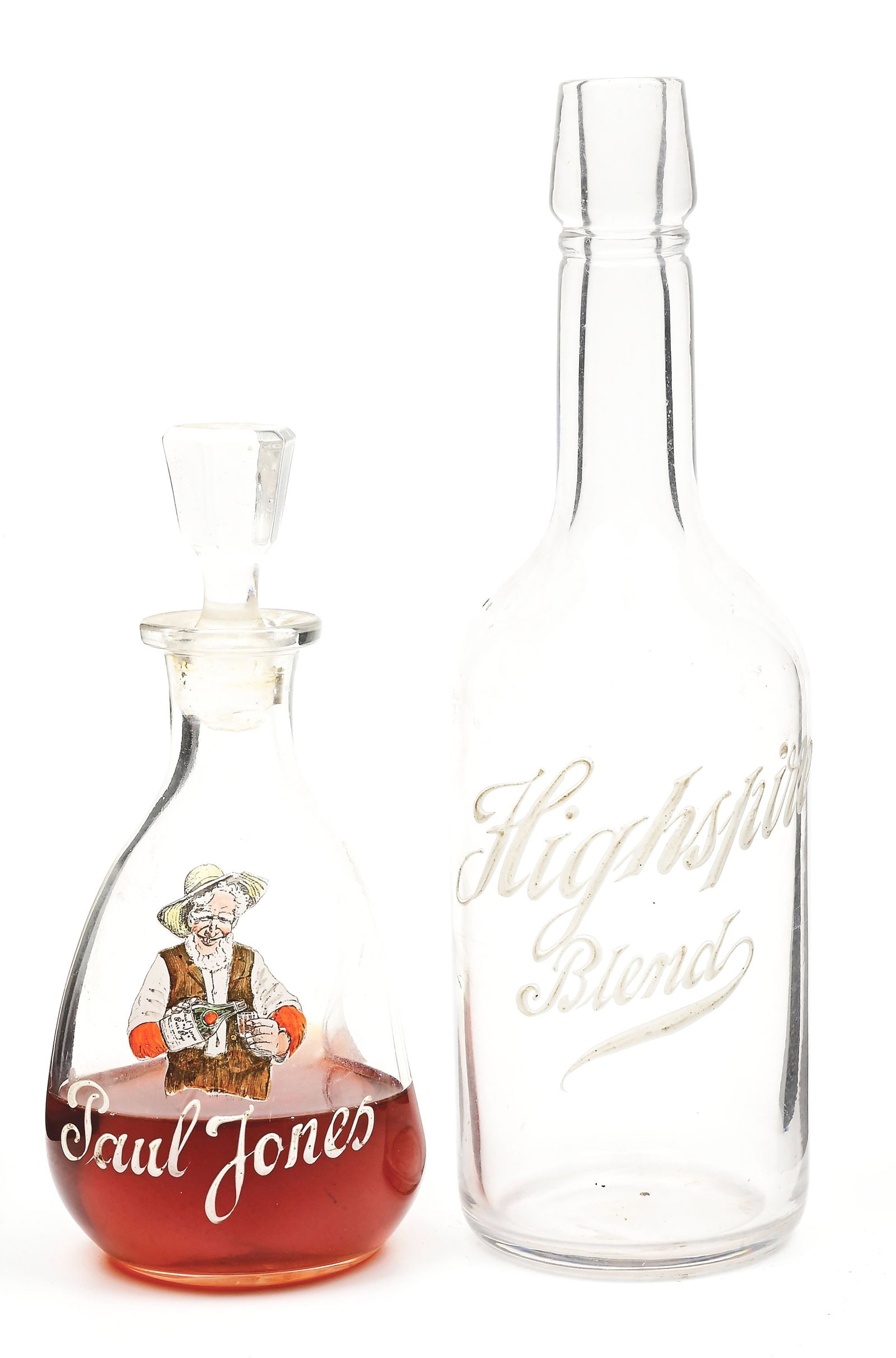 LOT OF 2: WHISKY DECANTERS.: Lot consists of: (A) Transfer graphic and enamel lettered "Paul Jones" decanter. (B) Enamel lettered "Highspire Blend." CONDITION: Very Good.