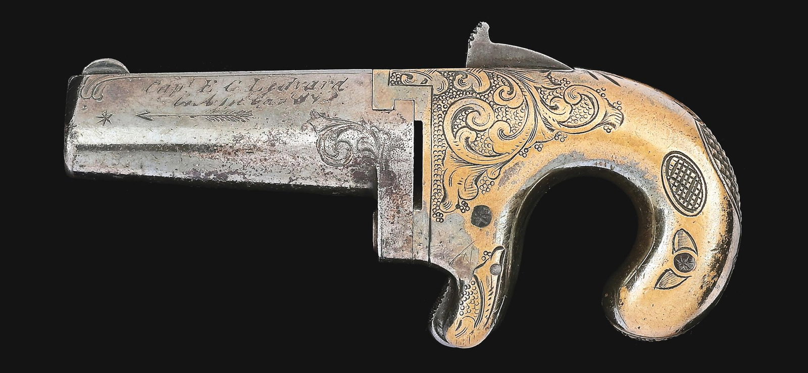 (A) SILVERED PLATED & ENGRAVED MOORE'S PATENT F.A. CO. SINGLE SHOT DERRINGER.: Brass frame with a steel barrel and a spur trigger. Gun is engraved with a foliate pattern with a punch dot background. There are two arrows engraved on the barrel along with an inscription to "CAP. E
