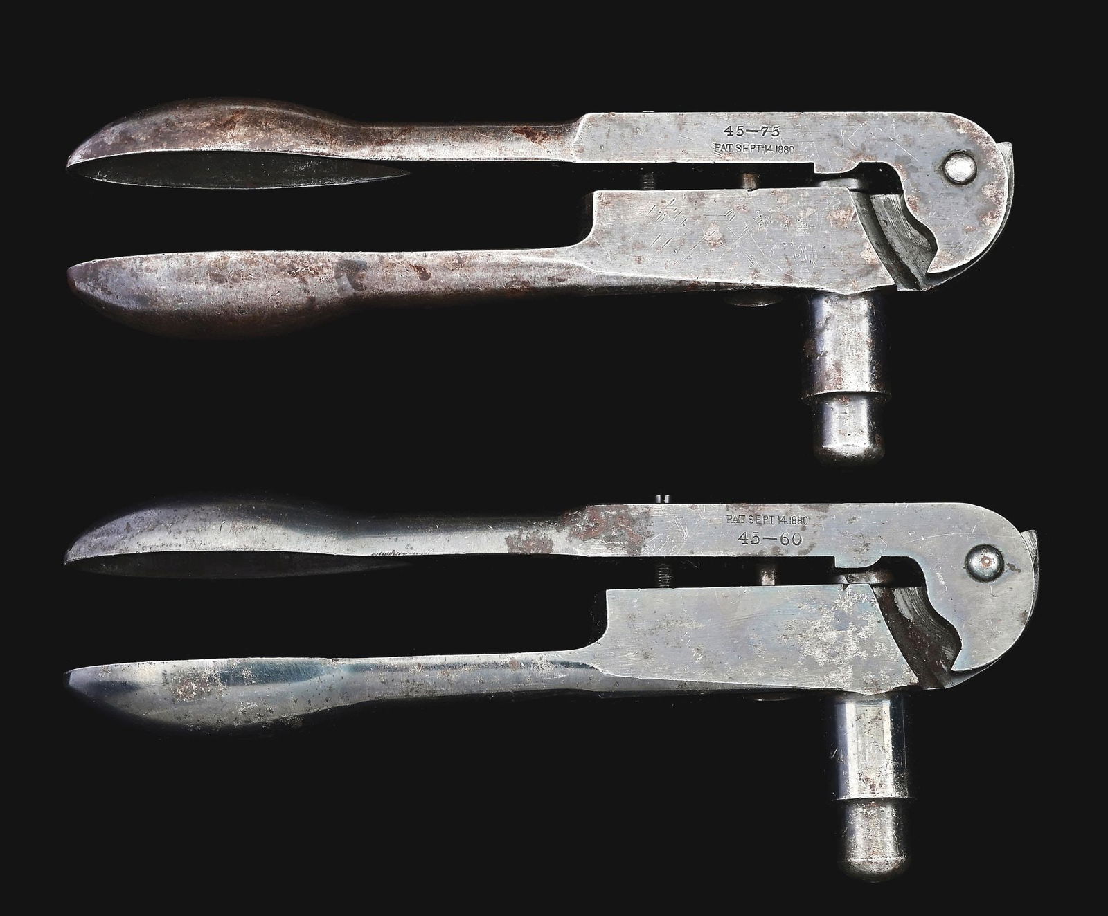 LOT OF 2 WINCHESTER RELOADING TOOLS FOR 1876 RIFLES.: Lot consists of: (A) .45-75 Winchester factory reloading tool. Patent date of SEPT 14, 1880. (B) .45-60 Winchester factory reloading tool. Patent date of September 14th, 1880. These are desirable earl