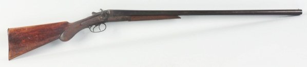 T. Barker SxS Hammer 12GA Shotgun.: Barrel length: 30". Length of pull: 14.5". All surfaces turning patina. Original stock shows handling marks. Originality: 75%. Condition (Fair).