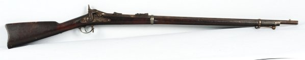 US Springfield Model 1879.: 45.70 caliber. This rifle is in "as found" condition with oxidized surfaces, old oil finish (dark) on stock. Ramrod is not original. Condition (Good). Size 52" L.