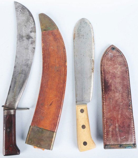 Lot of 2: Bolo & Machete.: Includes one USMC Chatillon NY round point Bolo in correct Boyt leather sheath and one unmarked Collins US Signal Corps machete in correct unsigned leather sheath. Condition (Very Good - Excellent).