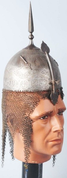 Indo Persian Khula Khud Style Parade Helmet.: Circa 1850 to 1870. Beautifully etched with floral designs. 1 - 1/2" wide border completely around the base, with etched panels of prayers, highlights decorated with gold and silver damascening. Origi