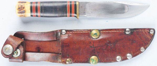 M.S.A. Co. Early "Ideal" Sheath Knife.: With stag crown on stacked leather handle. Knife is in poorly repaired incorrect Marbles sheath. Condition (Good - Very Good). Size Blade: 4 - 1/4" L.