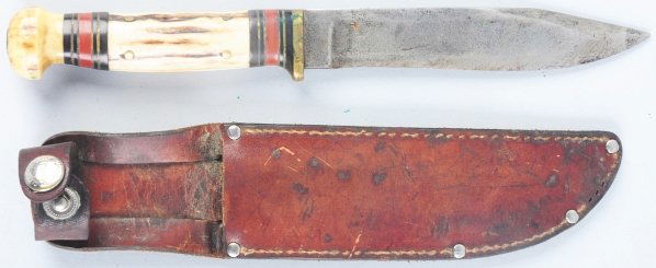 Marbles Safety Axe Co. Gladstone "Ideal" Knife.: This example has a stag crown on stag handle (cracked at pin). Knife has unusual two part stacked half guard. Blade is in incorrect sheath made for a later Ideal. Sheath has a signed button. Condition