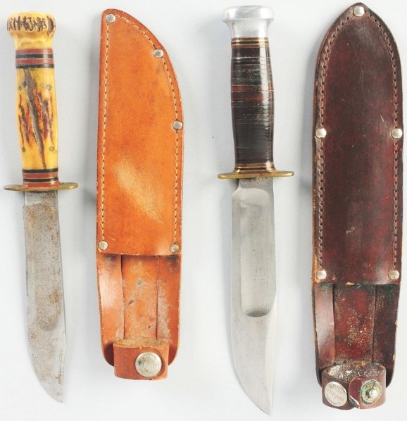 Lot of 2: Marbles Gladstone Sheath Knifes.: Includes one "Ideal" sheath knife with aluminum crown on stacked leather handle. Knife is in correct sheath with signed button. Also includes an "Ideal" sheath knife with stag crown (cracked) on stag