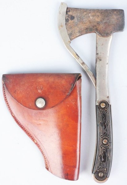 M.S.A. Co. Safety Pocket Axe.: Type 2. Safety guard is marked "Marble Arms & Mfg. Co. Gladstone Mich. U.S.A. Patd. 1898". Axe head is unmarked and covered with a light rust. The handles are a wonderful embossed hard rubber bearing 