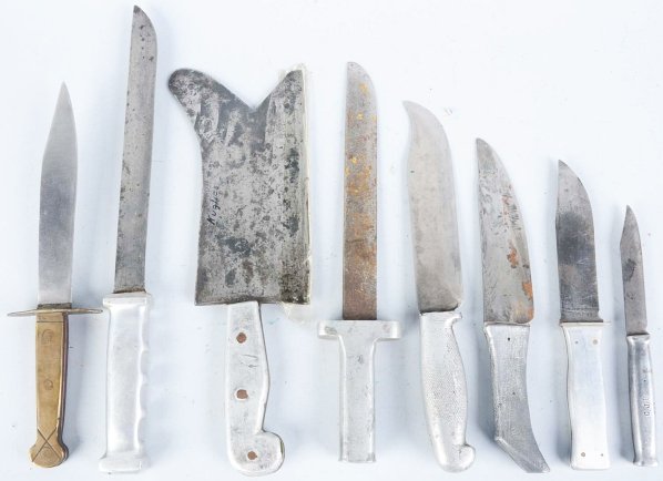 Lot of 8: Handmade Theater Knives.: All with metal handles. Group also includes a meat cleaver. Seven knives are handled in aluminum and one in brass. Condition (Very Good). Size Largest Blade: 9 - 1/4" L.