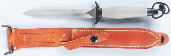 Gerber USA #008796 Dagger Blade Knife.: Portland, Oregon. Handle is black and gray "armorhide" with lanyard hole. Correct signed sheath is included. Condition (Near Mint Plus). Size Blade: 6 - 3/4" L.